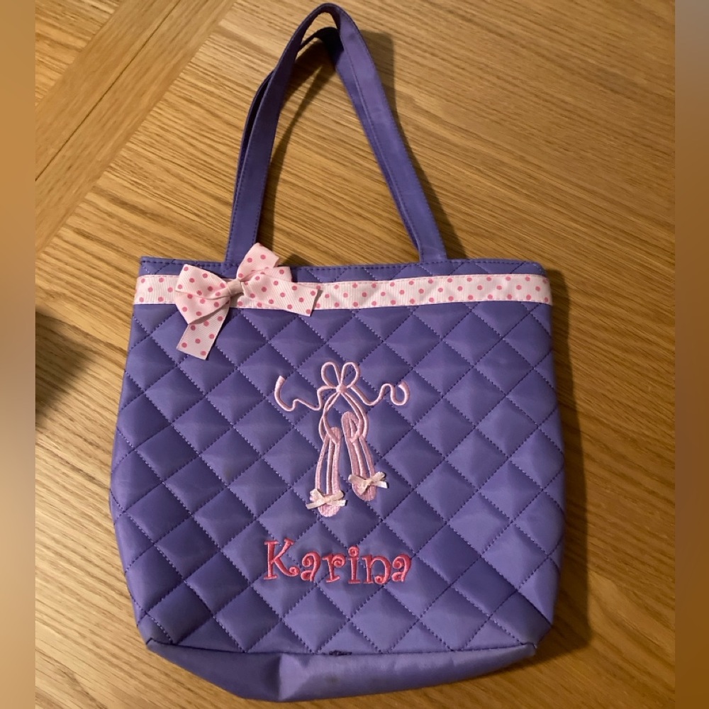 Girls purse purple and pink with name Karina on it. pink bow with pink dots